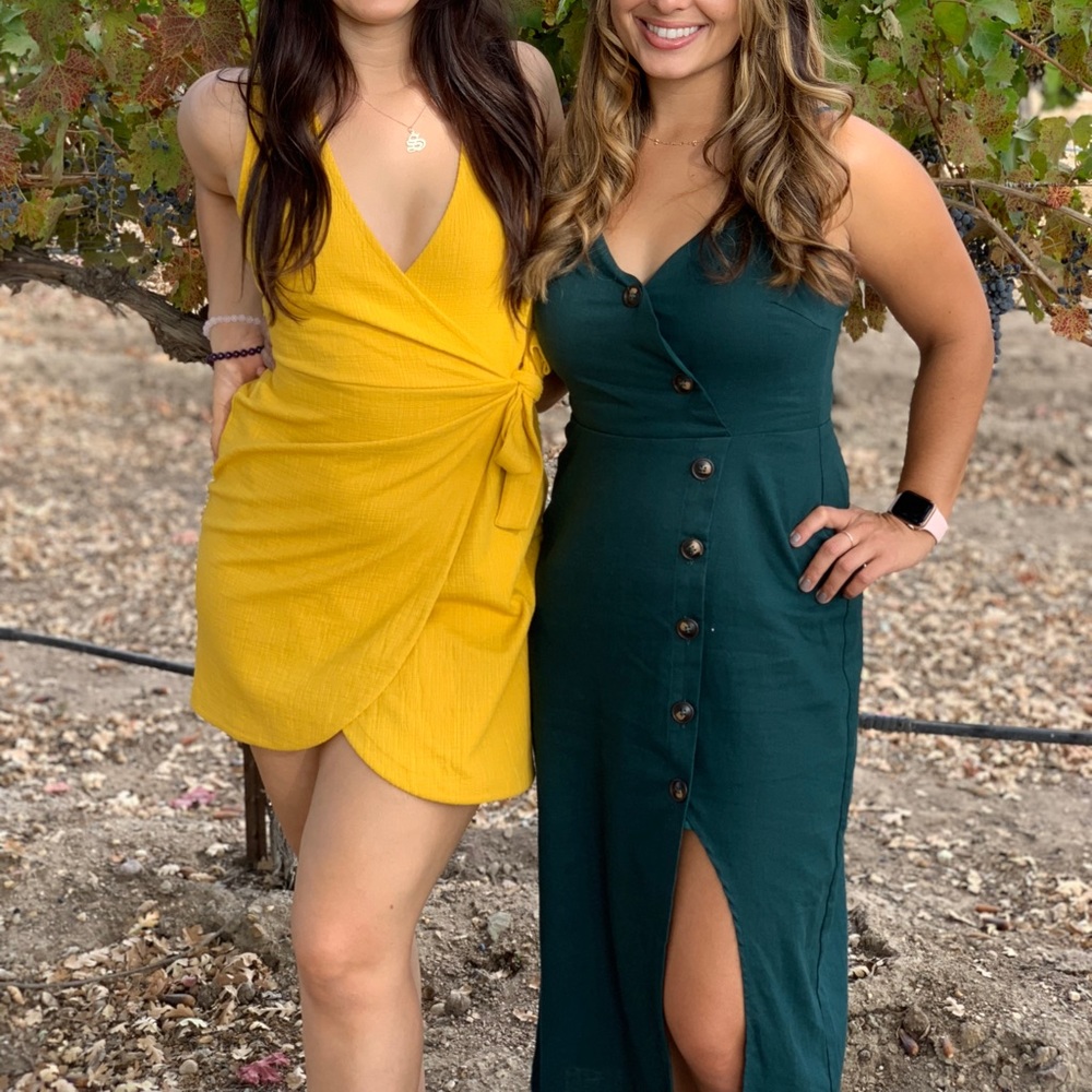 Green mid length dress with buttons and side slit